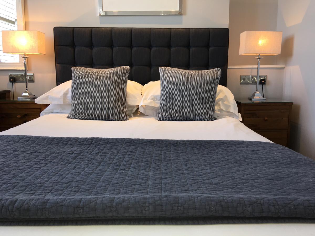 A Room With A View Brighton Exterior foto A bed with a throw